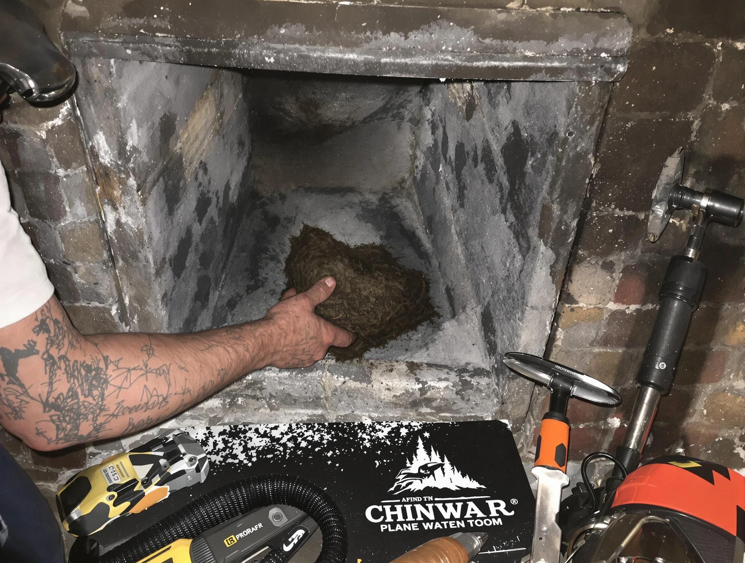 Holladay Chimney Sweep safely removing debris and screening chimney in Holladay, UT